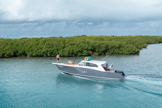 Exclusive Isla Mujeres and Cancun Private Yacht Tour - Isla Mujeres cruise route: Punta Sur, lagoon time, then Playa Norte