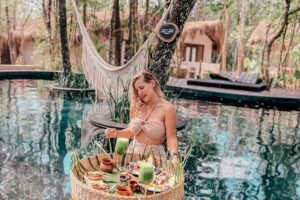 Floating breakfast in The Yellow Nest (near Dos Ojos cenote) - Your timeline: what a 9:00 am to 6:00 pm day feels like