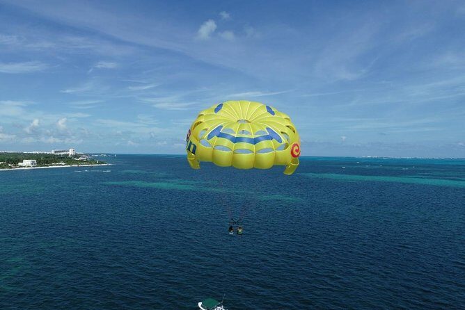 Fly Above Cancun Bay: Parasailing Experience - Safety-first crew, harness comfort, and the human touch