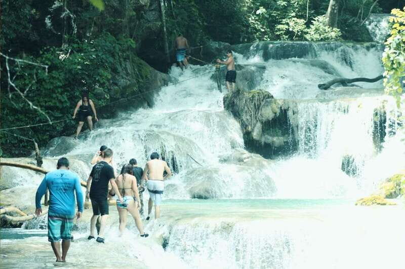 From Huatulco: Magical Copalitilla Waterfalls with Entry - Waterfall time: swimming, climbing, and cave exploration