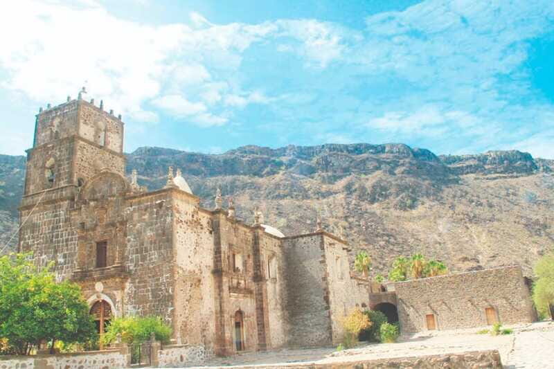 From Loreto: Historical San Javier Mission Tour with Lunch - Walking the cobblestone lanes, fruit trees, and olive gardens