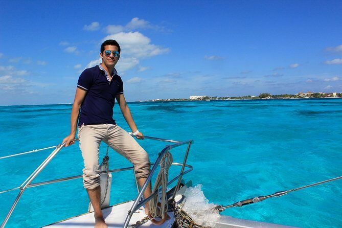 Full-Day Sailing Trip to Mujeres Island from Playa del Carmen - Manchones Reef Snorkeling: Sea Turtles, Sculptures, and Reality Checks