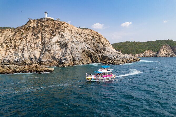 Full Day Tour of the Bays of Huatulco - Santa Cruz Bay: port history and coral-clear water nearby