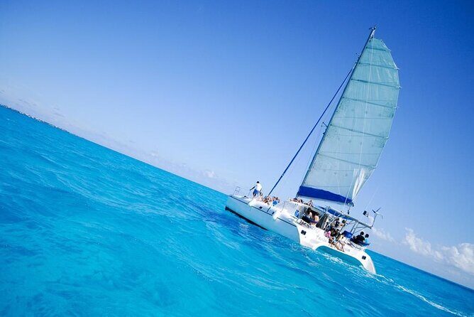 Half Day Sailing Private Catamaran to Isla Mujeres - Isla Mujeres Time: Anchor Off the North Beach or Step onto Land
