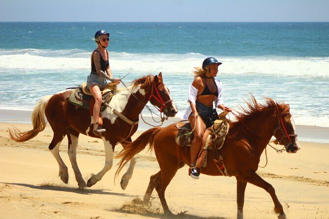 Horseback Riding Adventure in Playa Migriño with Tequila Tasting - Riding the rocky trail down to the sea sand
