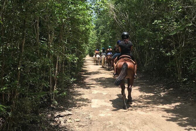 Horseback Riding plus ATV, Cenote, Ziplines, and Lunch - ATV challenge on jungle roads: fun, bumpy, and motion-prone
