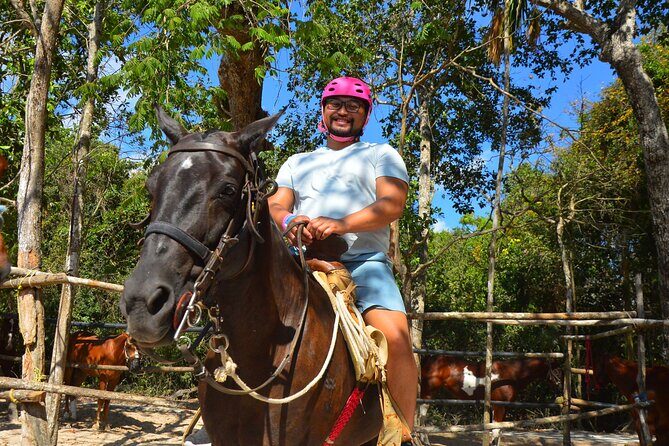 Horseback riding with ATV, zip lines and cenote, lunch and transfer - Horseback riding: calm trails, short time, and worn tack warnings