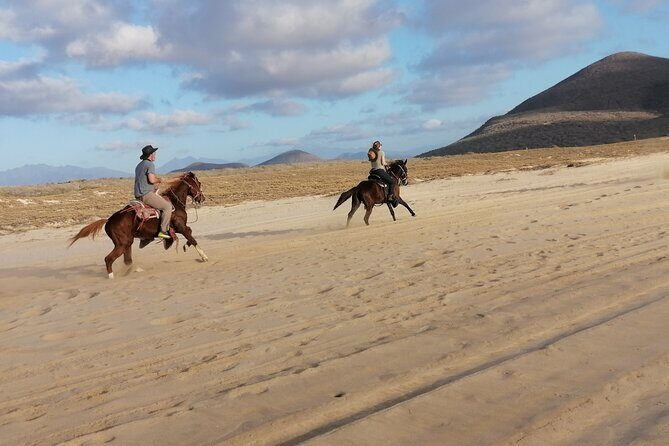 Horseback riding - The ride plan: beach trails, hills, and Playa La Cachora stops