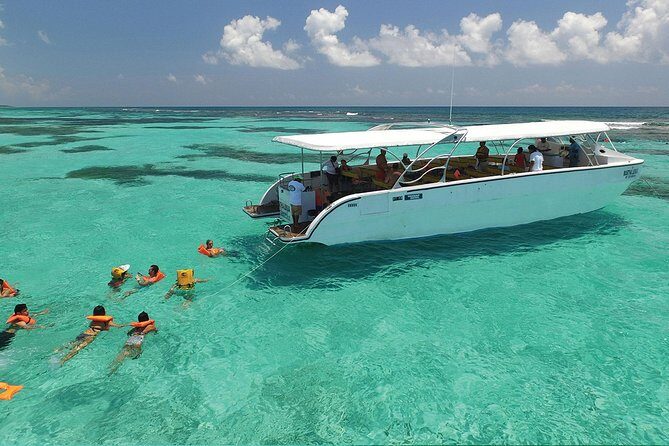 Isla Contoy and Isla Mujeres Tour with Snorkeling from Cancun - The Contoy lunch: Mayan-style BBQ and why this stop matters