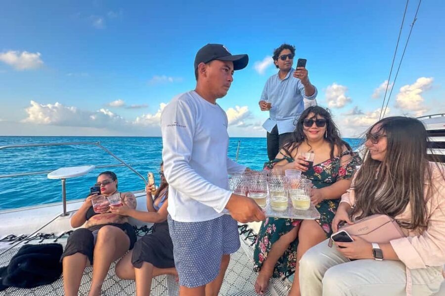 Isla Mujeres: Catamaran Ride with Open Bar, Snorkeling, and Lunch - Pickup, drop-off, and where the day starts