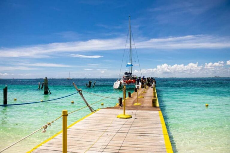 Isla Mujeres: Catamaran Ride with Open Bar, Snorkeling, and Lunch - Playa Norte and the beach club: where the island time is spent