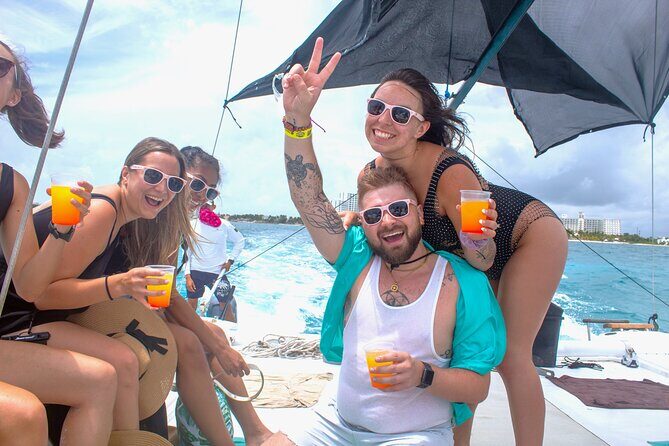 Isla Mujeres Catamaran Tour, Snorkeling, Fun, Open bar and Buffet - The Return Sail: Toasts, Photos, and One More Swim Chance