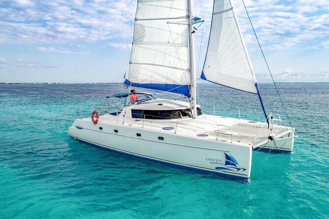 Isla Mujeres Catamaran Tour with Open Bar, Lunch and Snorkeling - Price and logistics: the $59 ticket plus the $45 dock fee reality