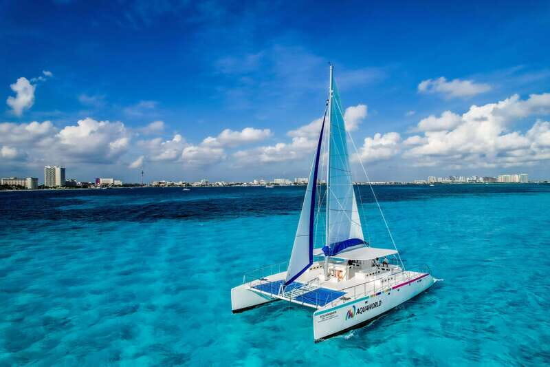 Isla Mujeres: Catamaran with Open Bar, Snorkeling and Lunch - A full-day catamaran plan that actually fits a vacation schedule