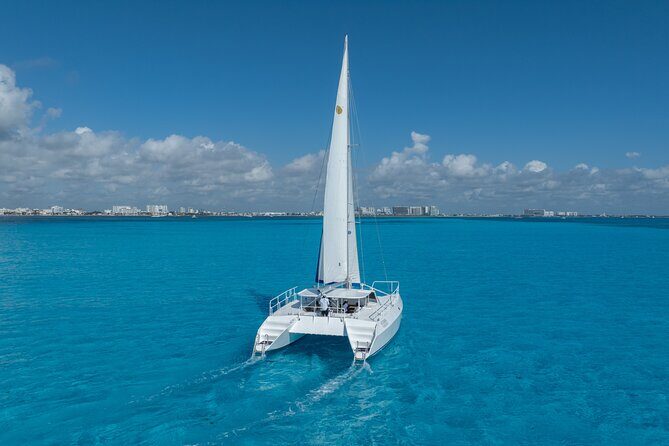 Isla Mujeres Day Tour with Catamaran, Snorkeling & Beach Club - The Catamaran Vibe: Group Size, Noise Level, and Open Bar Energy