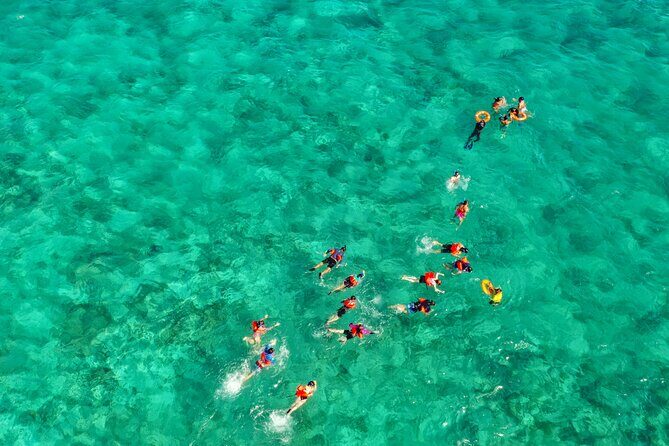 Isla Mujeres Island and Snorkeling Tour - Downtown Isla Mujeres Magic Town: malecon time and the simple joys