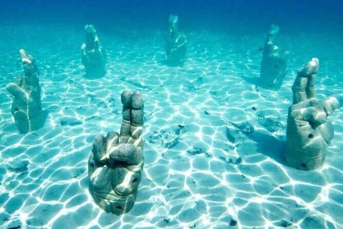 Isla Mujeres on luxury catamaran with snorkel, open bar and lunch - Group size, comfort, and what kind of traveler will love this