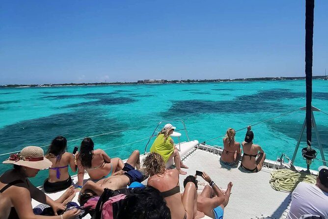 Isla Mujeres Premium Catamaran Tour with transportation from Playa del Carmen - Playa del Carmen Pickup and the Cancun Check-In Clock