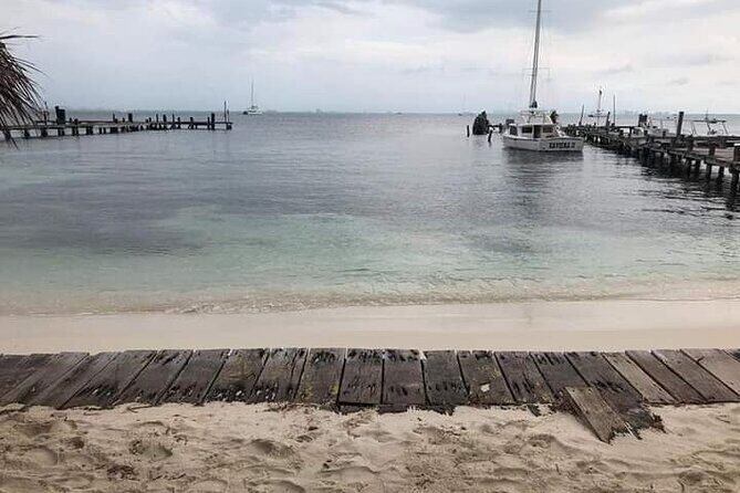 Isla Mujeres Premium Tour in Private Catamaran with Lunch - Arrecife El Meco Reef: Fish, Underwater Statues, and a Smart Time Slot