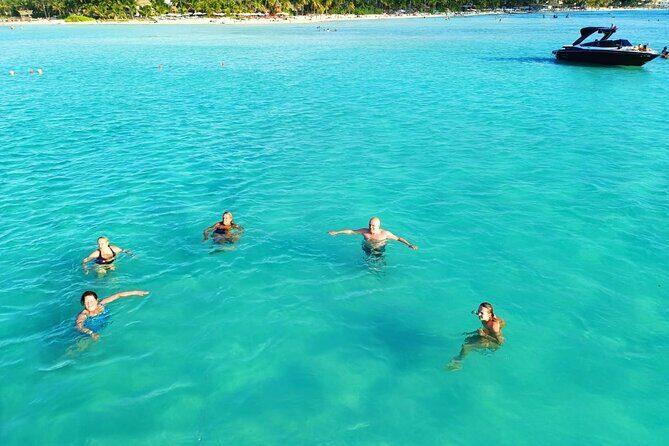 Isla Mujeres Premium Tour in Private Catamaran with Lunch - Isla Mujeres Return Cruise: Sunset Sailing and Wind-Dependent Spinnaker