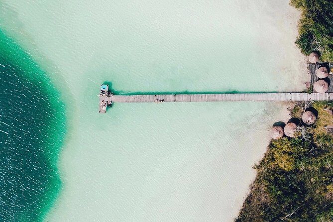Lagoon Paddleboarding Tour in Tulum - Those water swings: fun photos, but also actual downtime