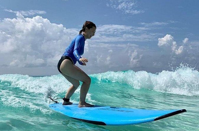 Learn to Surf in 1 Easy Lesson in Cancún - What’s included for $95.58: equipment, rash guard, and shade