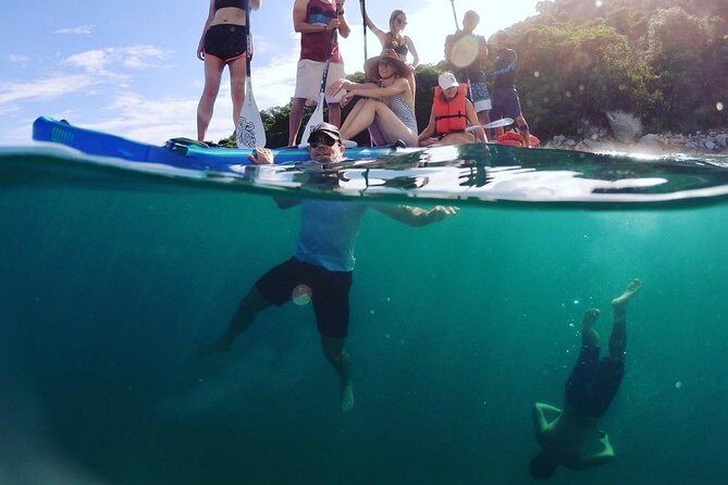 Los Arcos, Animas and Quimixto Snorkel Cruise in Puerto Vallarta All Inclusive - Crew Energy, Music, and the Party-Boating Effect