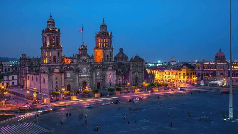 Mexico City at Night Walking tour with optional Torre Latino - Zócalo, Mexico City Cathedral, and the National Palace Front