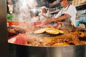 Mexico City evening street taco tour - Stop 1 in Narvarte Poniente: walking in where the taquerias live