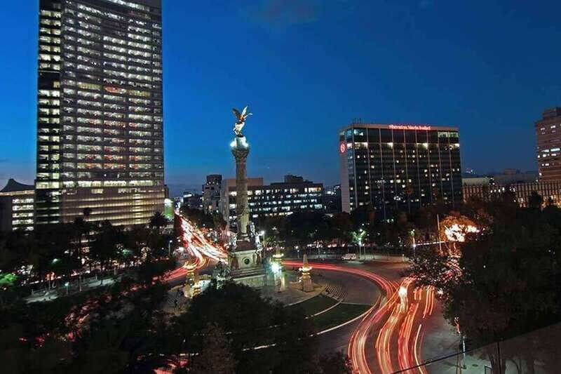 Mexico City: Night City Tour in a Double Decker Bus - A red double-decker night ride: the point is the view