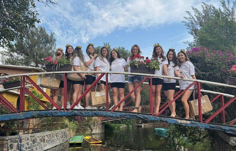 Mexico City: Xochimilco Boat Party with Unlimited Drinks - Music, Games, and Photo Moments: How the Crew Keeps You Smiling