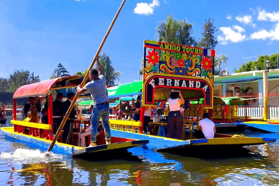 Mexico City: Xochimilco, Coyoacan & Frida Kahlo with Lunch - Xochimilco by trajinera: traditions on the canals, plus lunch timing