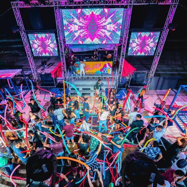 Neon Glow night Beach Party Regular - Fire, Pyrotechnics, Dancers, and Champagne Showers: The Main Event Moment
