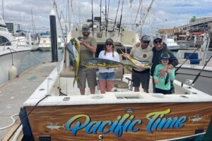 Pacifictime Sports Fishing in Cabos san lucas - The 34 ft Blakfin Boat and Crew Working the Trolling Game