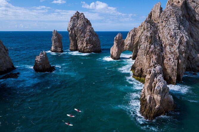 Paddleboard Expedition to the Arch of Cabo San Lucas, Lovers Beach & Snorkel - Heading to El Arco: sea lions, rock formations, and guide-led pacing