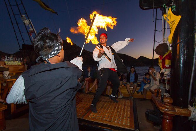 Pirate Ship Sunset Dinner and Show in Los Cabos - The Buccaneer Queen Show Segment on the Return: Fire, Acrobatics, and the Big Interaction Moment