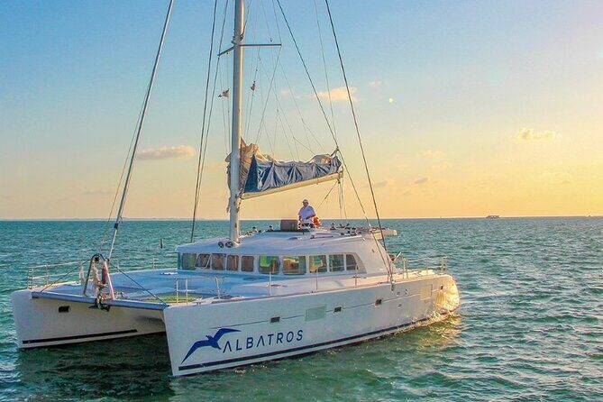 Plus Full Day Catamaran Tour to Isla Mujeres All Inclusive - Entering the day: catamaran comfort, pickup, and group size