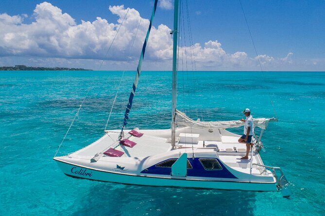 Premium Isla Mujeres Tour by Private Catamaran - Playa Tortugas check-in and the vibe before you sail