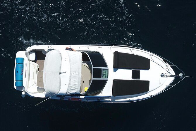 Private 3hr Yacht Cruise in Cabo San Lucas all included - Chileno Bay: Beach Time, Snorkel Options, and Paddle Board Fun