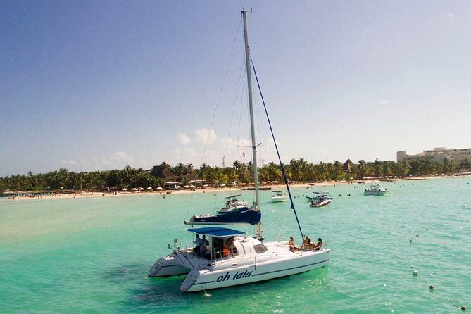 Private Catamaran from Cancun to Isla Mujeres | For up to 25 ppl - Playa Norte swim stop: your break for turquoise water time