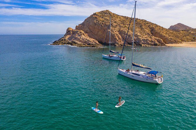 Private Luxury Sailing Cruise in Los Cabos with Lunch and Open Bar - The deck experience: service, music, and your group’s comfort