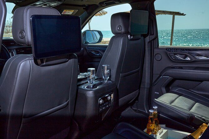 Private Luxury SUV Transfers from Tulum Airport - Where to Meet: The Black Luxury Service Booth and the Name Tablet