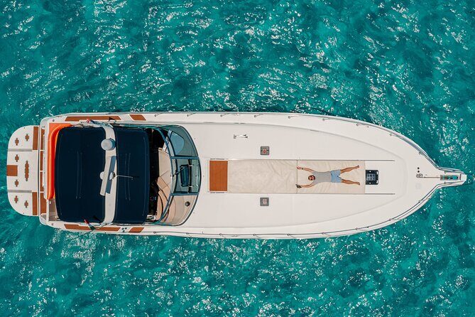 Private Luxury Yacht 55FT Rental in Cancun - What’s Included Onboard: Ice, Sodas, Water, Snorkel Gear, and a Lily Pad