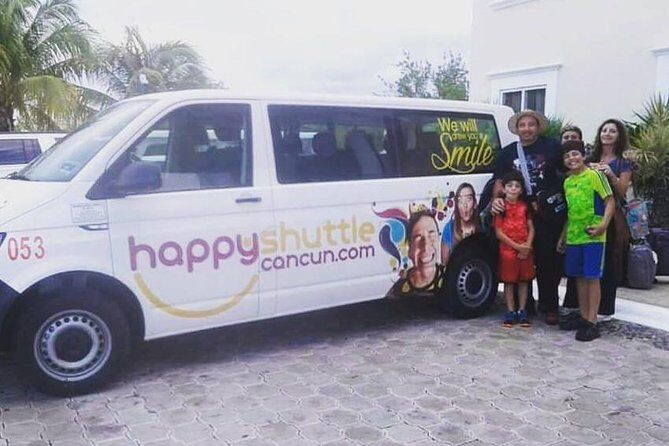 Private Roundtrip Transportation from Cancun Airport to Playa del Carmen - Finding your driver: the green shirt and the Happy Shuttle banner