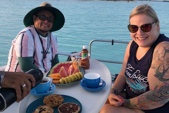 Private Sunrise Tour with Breakfast on Board - Pirates Channel: coffee, fruit, and sweet cakes on the water