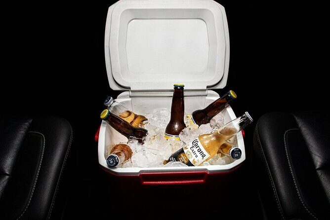 Private SUV Round-Trip from Airport to Hotels in the Corridor - Drinks on the Way In vs. the Way Out