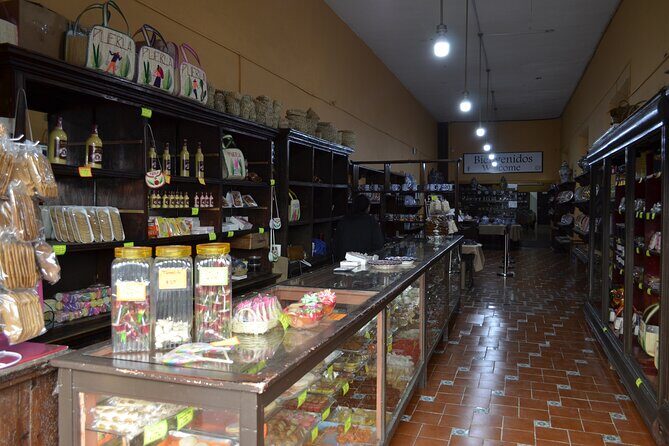 Puebla + Secret Tunnels of Xanenetla (private tour) - Calle de los Dulces and the sweet-shopping reality check