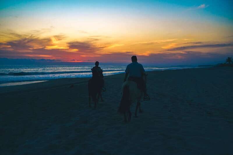 Puerto Escondido: Sunset Horse Back Riding Tour - Getting picked up in Puerto Escondido and riding out to the river