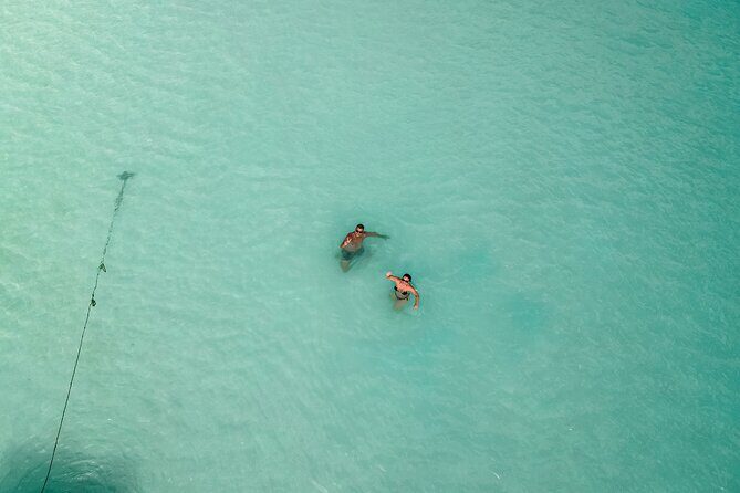 Sailboat tour across the seven colors lagoon in Bacalar - Emerald Cenote: Your Bright-Water Swim Pause