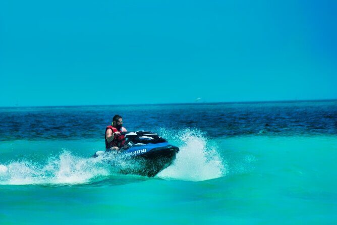 Speedboat across the Mangroves & Snorkel with Jet Ski Rental - Snorkeling at Punta Nizuc: coral, fish, and the MUSA art layer
